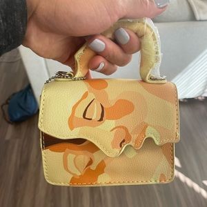 Kid Super kissing face mini bag